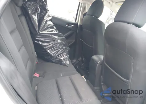 2015 Mazda Cx-5 Touring z USA, uszkodzony, nr VIN JM3KE4CY6F0509478